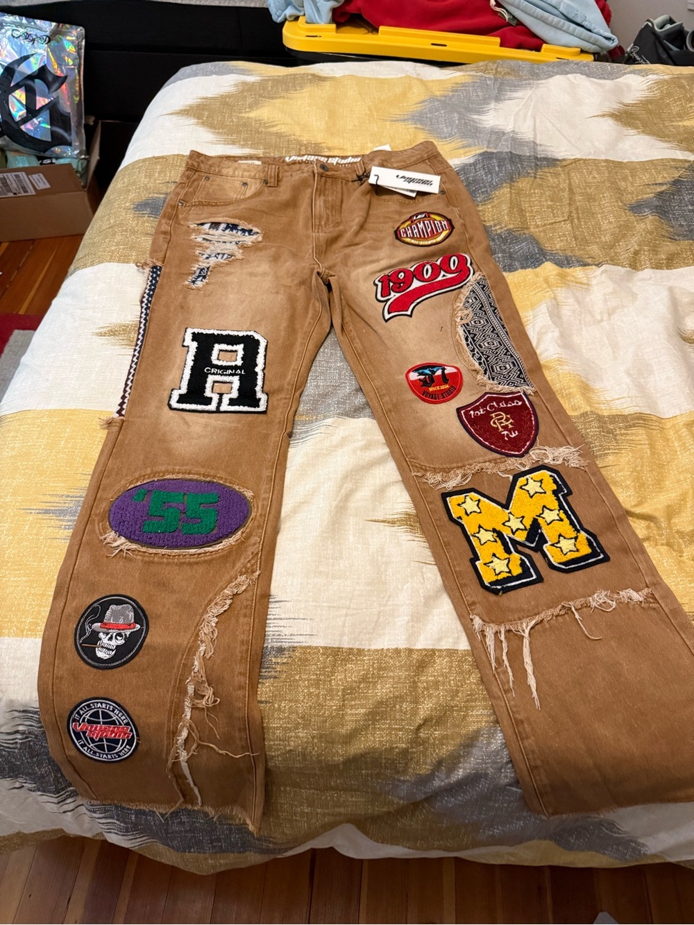 Voyage Studios Men's Brown Patchwork Distressed Jeans with Embroidered Badges